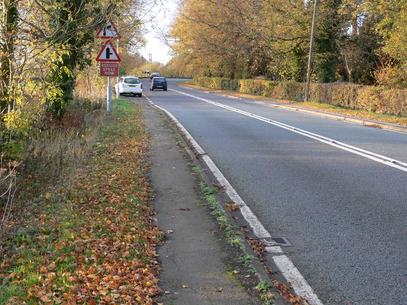 London Road, Great Glen. The new access would be taken off this road. The photo is illustrative and does not show the application site.