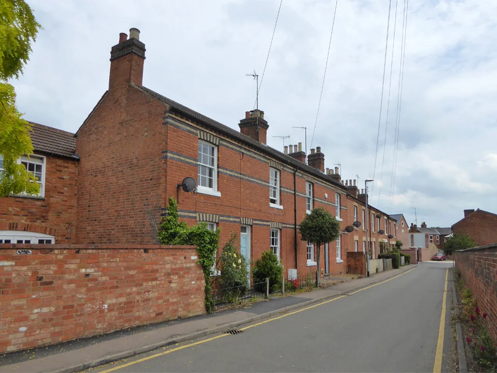 Terraced houses on School Lane, Market Harborough. Terraced homes in the district are up 9.1% in a year. The photo is illustrative and does not show a property covered by these figures.